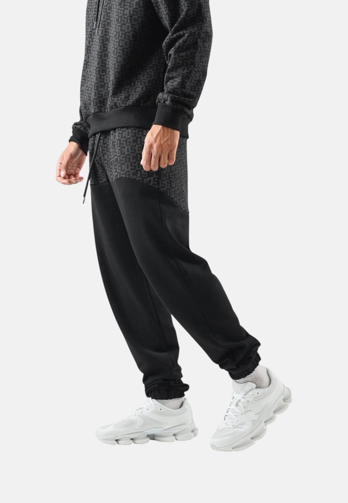 Pantaloni Tuta Uomo Gcds Puro cotone, motivo monogram, vita elasticizzata, coulisse regolabile, tasche laterali, fondo elasticizzato Monogram Sweatpants C2MWQI122F245