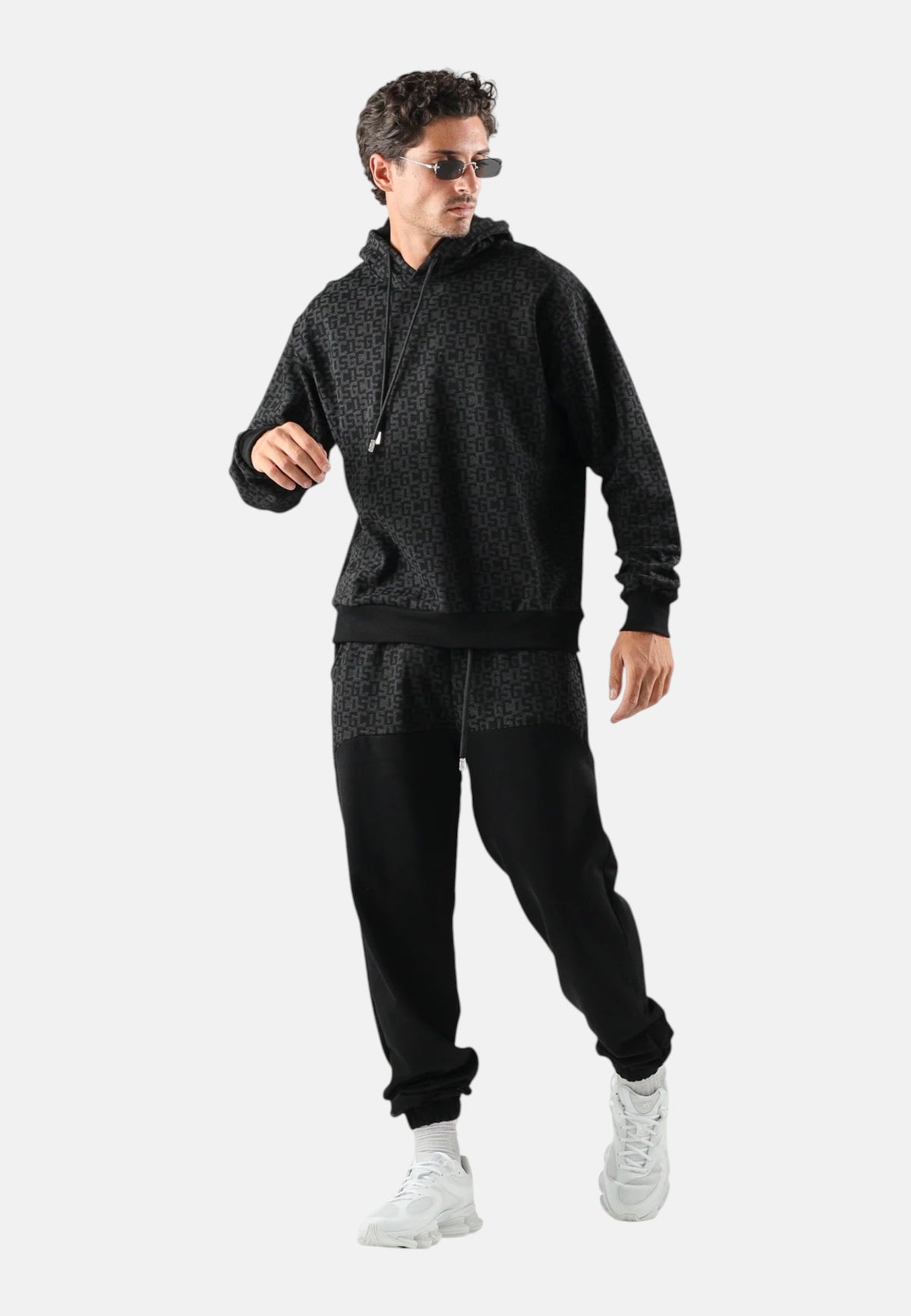 Pantaloni Tuta Uomo Gcds Puro cotone, motivo monogram, vita elasticizzata, coulisse regolabile, tasche laterali, fondo elasticizzato Monogram Sweatpants C2MWQI122F245