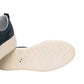 Sneakers Basse Donna Nero Giardini Tomaia in pelle scamosciata, chiusura con lacci, pompon decorativo, suola platform oversize, Made in Italy  I617441D